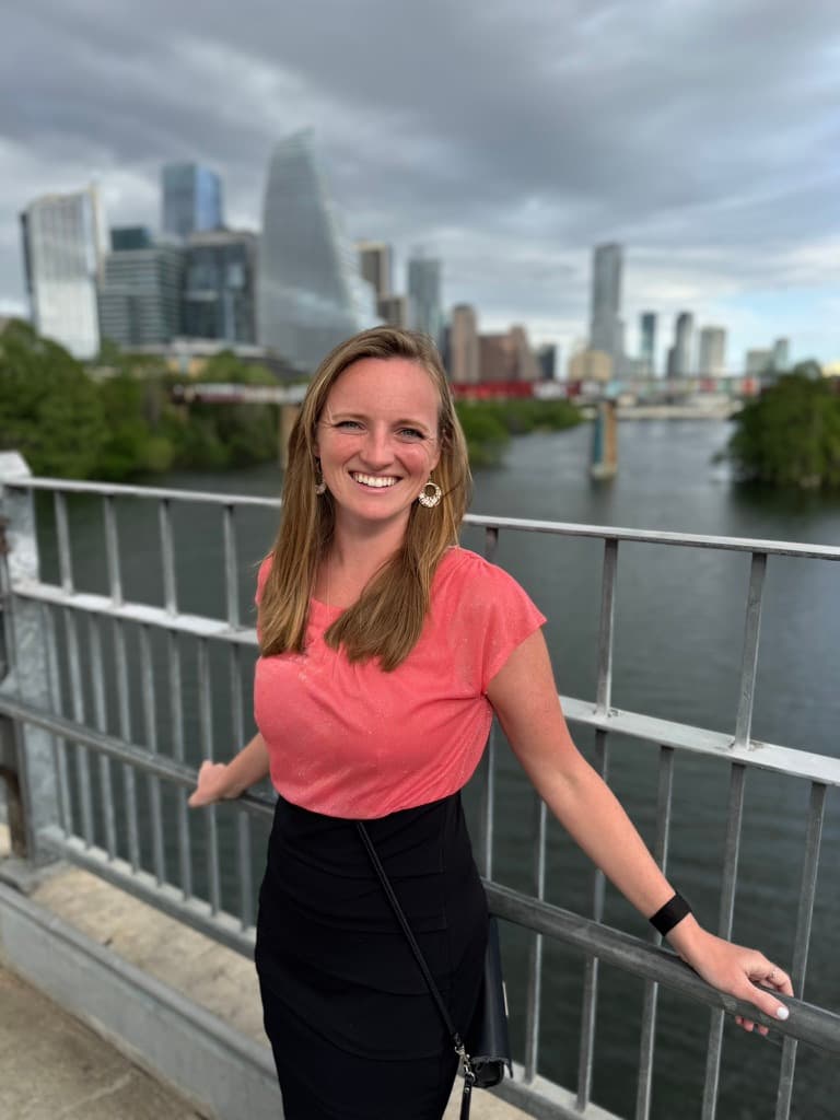 Nora on a bridge over Lady Bird Lake in Austin